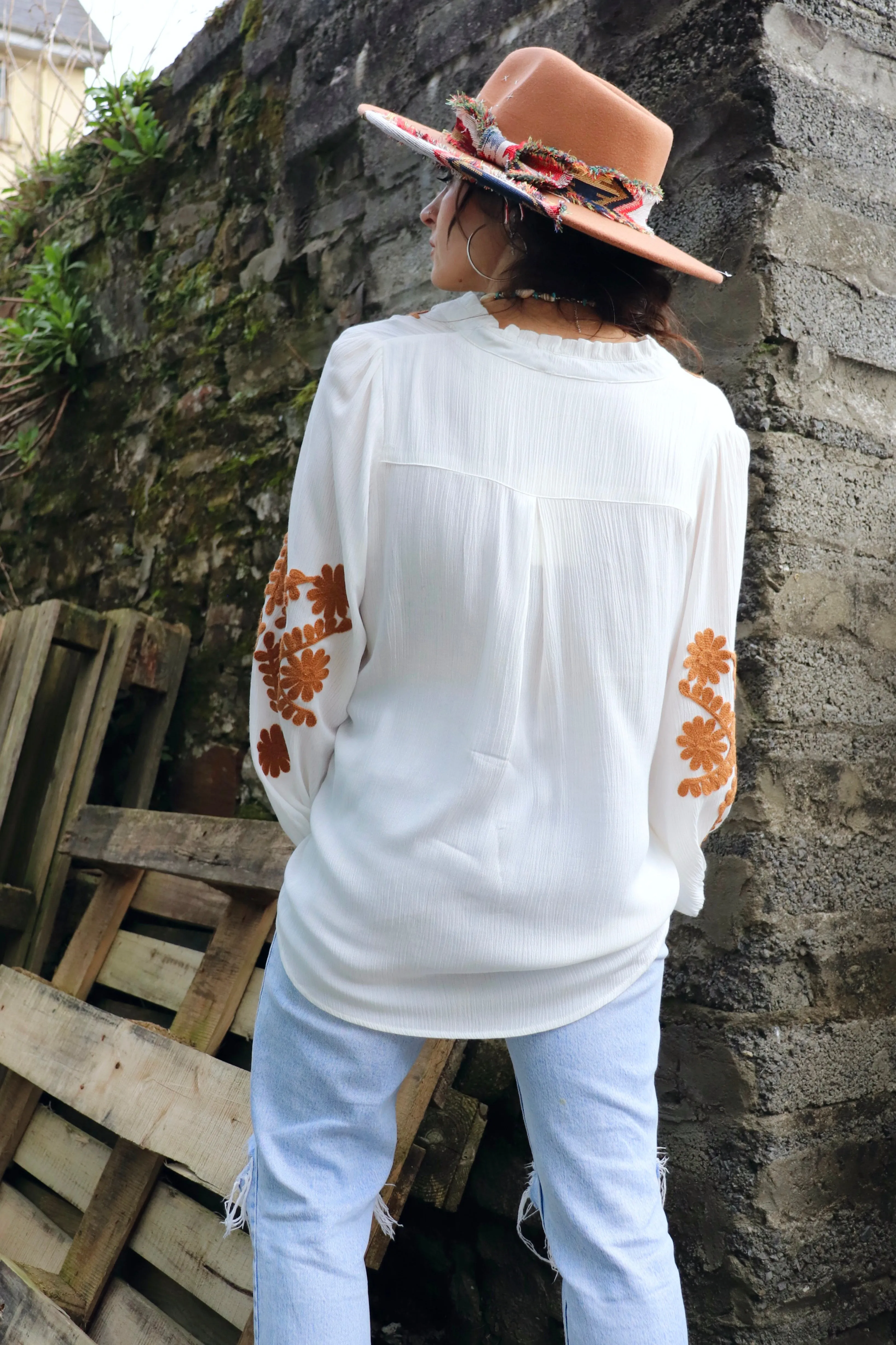 Floral embroidered peasant blouse