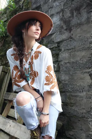 Floral embroidered peasant blouse